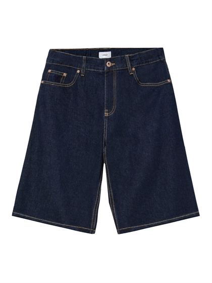 Grunt Giant Raw Blue Shorts – Lange denim shorts til drenge i mørk raw blue vask